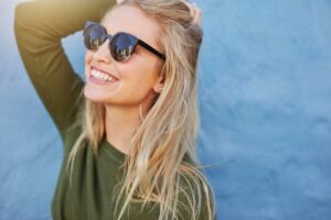 Woman smiling in sunshine